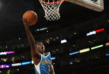 LOS ANGELES, CA - NOVEMBER 08:  Darren Collison #2 of the New Orleans Hornets goes up for a shot in front of Sasha Vujacic #18 of the Los Angeles Lakers  on November 8, 2009 at Staples Center in Los Angeles, California. The Lakers won 104-88.   NOTE TO USER: User expressly acknowledges and agrees that, by downloading and/or using this Photograph, user is consenting to the terms and conditions of the Getty Images License Agreement.  (Photo by Stephen Dunn/Getty Images)
