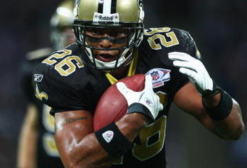 LONDON - OCTOBER 26: Deuce McAllisters of the New Orleans Saints runs with the ball during the Bridgestone International Series NFL match between San Diego Chargers and New Orleans Saints at Wembley Stadium on October 26, 2008 in London, England.  (Photo by Laurence Griffiths/Getty Images)