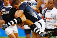 EDINBURGH, SCOTLAND - NOVEMBER 14:  Alex Grove of Scotland tackles Josh Matavesi of Fiji during the Bank of Scotland Corporate Autumn Tests at Murrayfield Stadium on November 14, 2009 in Edinburgh, Scotland.  (Photo by Jeff J Mitchell/Getty Images)