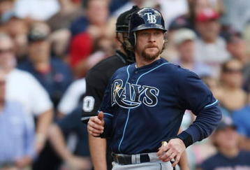 BOSTON - SEPTEMBER 13:  Gregg Zaun #9 of the Tampa Bay Rays scores a run in the seventh inning against the Boston Red Sox on September 13, 2009 at Fenway Park in Boston, Massachusetts.  (Photo by Elsa/Getty Images)