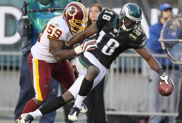 PHILADELPHIA - NOVEMBER 29:  Jeremy Maclin #18 of the Philadelphia Eagles makes a catch and is pushed out of bounds by London Fletcher #59 of the Washington Redskins during their game at Lincoln Financial Field on November 29, 2009 in Philadelphia, Pennsylvania.  (Photo by Al Bello/Getty Images)