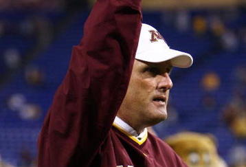 MINNEAPOLIS - SEPTEMBER 13:  Minnesota Golden Gophers' head coach Tim Brewster pumps his fist following his teams victory over the Montana State Bobcats at the Metrodome on September 13, 2008 in Minneapolis, Minnesota. Minnesota defeated Montana State 35-23.  (Photo by Jeff Gross/Getty Images)