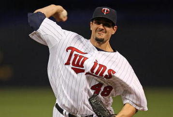 MINNEAPOLIS - OCTOBER 11: Carl Pavano #48 of the Minnesota Twins delivers the ball against the New York Yankees in Game Three of the ALDS during the 2009 MLB Playoffs at the Hubert H. Humphrey Metrodome on October 11, 2009 in Minneapolis, Minnesota. (Photo by Jonathan Daniel/Getty Images)