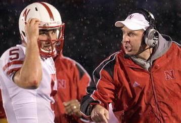 COLUMBIA, MO - OCTOBER 08:  Quarterback Zac Lee #5 of the Nebraska Cornhuskers listens to head coach Bo Pelini during the game against the Missouri Tigers on October 8, 2009 at Faurot Field/Memorial Stadium in Columbia, Missouri. (Photo by Jamie Squire/Getty Images)