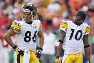 KANSAS CITY, MO - NOVEMBER 22:  Wide receivers Hines Ward #86 and Mike Wallace #10 of the Pittsburgh Steelers stand on the field together during NFL action against the Kansas City Chiefs at Arrowhead Stadium on November 22, 2009 in Kansas City, Missouri.  The Chiefs defeated the Steelers 27-24.  (Photo by Wesley Hitt/Getty Images)