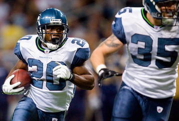 ST. LOUIS - NOVEMBER 29:  Justin Forsett #20 of the Seattle Seahawks rushes against the St. Louis Rams at the Edward Jones Dome on November 29, 2009 in St. Louis, Missouri.  The Seahawks beat the Rams 27-17.  (Photo by Dilip Vishwanat/Getty Images)