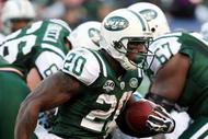 EAST RUTHERFORD, NJ - NOVEMBER 29:  Thomas Jones #20 of the New York Jets runs the ball against the Carolina Panthers on November 29, 2009 at Giants Stadium in East Rutherford, New Jersey. The Jets defeated the Panthers 17-6.  (Photo by Jim McIsaac/Getty Images)