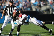 CHARLOTTE, NC - NOVEMBER 15: Brent Grimes #20 of the Atlanta Falcons tackles Steve Smith #89 of the Carolina Panthers during their game at Bank of America Stadium on November 15, 2009 in Charlotte, North Carolina. (Photo by Streeter Lecka/Getty Images)