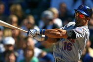 CHICAGO - AUGUST 30: Angel Pagan #16 of the New York Mets swings the bat against the Chicago Cubs on August 30, 2009 at Wrigley Field in Chicago, Illinois. The Mets defeated the Cubs 4-1. (Photo by Jonathan Daniel/Getty Images)
