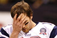 NEW ORLEANS - NOVEMBER 30: Quarterback Tom Brady #12 of the New England Patriots wipes his forehead with his hand during warm ups  against the New Orleans Saints at Louisana Superdome on November 30, 2009 in New Orleans, Louisiana. (Photo by Scott Halleran/Getty Images)