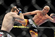 LAS VEGAS - NOVEMBER 21: Tito Ortiz (R) battles Forrest Griffin (L) during their Light Heavyweight Fight at the UFC 106 at Mandalay Bay Events Center on November 21, 2009 in Las Vegas, Nevada. (Photo by Jon Kopaloff/Getty Images)