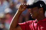 MELBOURNE, AUSTRALIA - NOVEMBER 15:  Tiger Woods of the USA acknowledges the crowd on the 18th hole during the final round of the 2009 Australian Masters at Kingston Heath Golf Club on November 15, 2009 in Melbourne, Australia.  (Photo by Mark Dadswell/Getty Images)