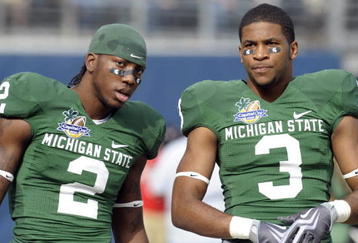 ORLANDO, FL - JANUARY 1: Wide receivers B. J. Cunningham #3 and Mark Dell #2 of the Michigan State Spartans warm up before play against the Georgia Bulldogs at the 2009 Capital One Bowl at the Citrus Bowl on January 1, 2009 in Orlando, Florida.  (Photo by Al Messerschmidt/Getty Images) 