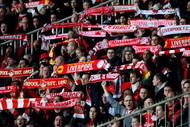 BUDAPEST, HUNGARY - NOVEMBER 24:  Liverpool fans support their team during the UEFA Champions League group E match between Debrecen and Liverpool at the Ferenc Puskas Stadium on November 24, 2009 in Budapest, Hungary.  (Photo by Richard Heathcote/Getty Images)