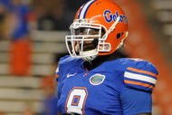 GAINESVILLE, FL - NOVEMBER 7: Defensive end Carlos Dunlap #8  of the Florida Gators sets on defense against the Vanderbilt Commodores  on November 7, 2009 at Ben Hill Griffin Stadium in Gainesville, Florida.  (Photo by Al Messerschmidt/Getty Images) 