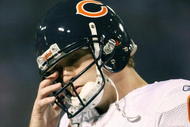 MINNEAPOLIS - NOVEMBER 29:  Jay Cutler #6 of the Chicago Bears walks off the field in the first half against the Minnesota Vikings on November 29, 2009 at Hubert H. Humphrey Metrodome in Minneapolis, Minnesota.  (Photo by Elsa/Getty Images)