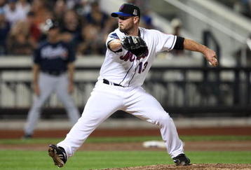 NEW YORK - AUGUST 20:  Billy Wagner #13 of the New York Mets delivers a pitch against the Atlanta Braves on August 20, 2009 at Citi Field in the Flushing neighborhood of the Queens borough of New York City.  (Photo by Jim McIsaac/Getty Images)
