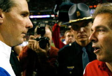 ATLANTA - DECEMBER 06:  Head coach Nick Saban of the Alabama Crimson Tide congratulates head coach Urban Meyer of the Florida Gators after the Gators 31-20 win in the SEC Championship on December 6, 2008 at the Georgia Dome in Atlanta, Georgia.  (Photo by Kevin C. Cox/Getty Images)