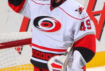 BUFFALO, NY - NOVEMBER 28:  Goaltender Michael Leighton #49 of the Carolina Hurricanes takes a water break during a break in NHL game action against the Buffalo Sabres on November 28, 2009 at HSBC Arena in Buffalo, New York. The Sabres defeated the Hurricanes 5-1. (Photo by Rick Stewart/Getty Images)