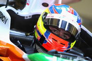 JEREZ DE LA FRONTERA, SPAIN - DECEMBER 01:  Paul Di Resta of Great Britain and team Force India in the team garage at the Circuito De Jerez on December 1, 2009 in Jerez de la Frontera, Spain.  (Photo by Mark Thompson/Getty Images)
