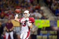 ST. LOUIS - NOVEMBER 22: Kurt Warner #13 of the Arizona Cardinals passes against the St. Louis Rams at the Edward Jones Dome on November 22, 2009 in St. Louis, Missouri.  The Cardinals beat the Rams 21-13.  (Photo by Dilip Vishwanat/Getty Images)