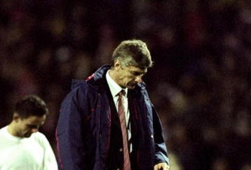 21 Oct 1998:  A disappointed Arsenal manager Arsene Wenger trudges off after seeing his side concede a late equaliser to Dynamo Kiev in the UEFA Champions League match at Wembley in London.  \ Mandatory Credit: Clive Brunskill /Allsport