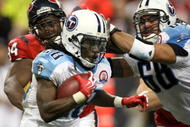 HOUSTON - NOVEMBER 23:  Running back Chris Johnson #28 of the Tennessee Titans carries the ball against the Houston Texans on November 23, 2009  at Reliant Stadium in Houston, Texas.  The Titans won 20-17.  (Photo by Stephen Dunn/Getty Images)