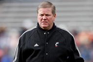 CINCINNATI - NOVEMBER 27:  Brian Kelly the Head Coach of the Cincinnati Bearcats is pictured during the game against the Illinois Fighting Illini at Nippert Stadium on November 27, 2009 in Cincinnati, Ohio.  (Photo by Andy Lyons/Getty Images)