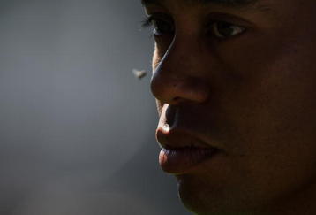 MELBOURNE, AUSTRALIA - NOVEMBER 10:  A fly hovers close to the face of Tiger Woods of the USA as he prepares to putt on the 18th hole during a practice round ahead of the 2009 Australian Masters at Kingston Heath Golf Club on November 10, 2009 in Melbourne, Australia.  (Photo by Lucas Dawson/Getty Images)