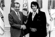 FILE PHOTO: President Richard Nixon meets with Elvis Presley December 21, 1970 at the White House. (Photo by National Archives)