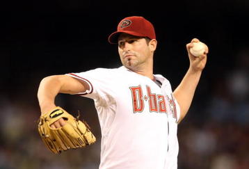 PHOENIX - AUGUST 10:  Starting pitcher Doug Davis #49 of the Arizona Diamondbacks pitches against the New York Mets during the major league baseball game at Chase Field on August 10, 2009 in Phoenix, Arizona. The Diamondbacks defeated the Mets 7-4.  (Photo by Christian Petersen/Getty Images)