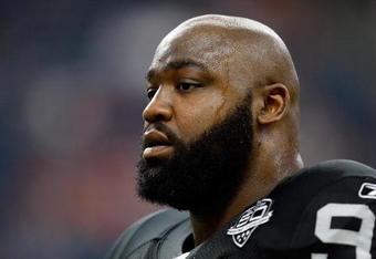 HOUSTON - OCTOBER 04:  Defensive end Tommy Kelly #93 of the Oakland Raiders at Reliant Stadium on October 4, 2009 in Houston, Texas.  (Photo by Ronald Martinez/Getty Images)
