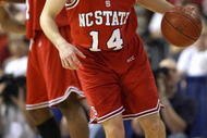 TAMPA, FL - MARCH 11: Engin Atsur #14 of the North Carolina State Wolfpack drives the ball against the North Carolina Tar Heels in the ACC Men's Basketball Tournament Championship on March 11, 2007 at the St. Pete Times Forum in Tampa, Florida. North Carolina defeated North Carolina State 89-80. (Photo by Doug Benc/Getty Images) 