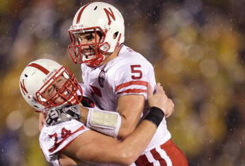COLUMBIA, MO - OCTOBER 08:  Quarterback Zac Lee #5 of the Nebraska Cornhuskers celebrates with Ricky Henry #74 during the game against the Missouri Tigers on October 8, 2009 at Faurot Field/Memorial Stadium in Columbia, Missouri. (Photo by Jamie Squire/Getty Images)