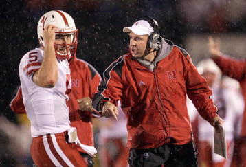 COLUMBIA, MO - OCTOBER 08:  Quarterback Zac Lee #5 of the Nebraska Cornhuskers listens to head coach Bo Pelini during the game against the Missouri Tigers on October 8, 2009 at Faurot Field/Memorial Stadium in Columbia, Missouri. (Photo by Jamie Squire/Getty Images)