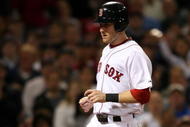 BOSTON - SEPTEMBER 29: Jason Bay #44 of the Boston Red Sox scores a run in the second inning against the Toronto Blue Jays on September 29, 2009 at Fenway Park in Boston, Massachusetts. (Photo by Elsa/Getty Images)