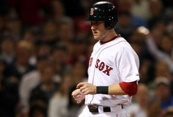 BOSTON - SEPTEMBER 29:  Jason Bay #44 of the Boston Red Sox scores a run in the second inning against the Toronto Blue Jays on September 29, 2009 at Fenway Park in Boston, Massachusetts.  (Photo by Elsa/Getty Images)