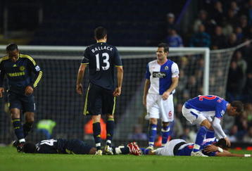 BLACKBURN, ENGLAND - DECEMBER 02:  Steven Nzonzi of Blackburn Rovers and Gael Kakuta of Chelsea lie injured after colliding during the Carling Cup Quarter Final match between Blackburn Rovers and Chelsea at Ewood Park on December 2, 2009 in Blackburn, England.  (Photo by Matthew Lewis/Getty Images)