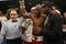 PHILADELPHIA - DECEMBER 02:  Bernard Hopkins (C) celebrates a win against Enrique Ornelas of Mexico with Philadelpia Eagles player Michael Vick (R) in Light Heavyweight bout on December 2, 2009 at The Liacouras Center in Philadelphia, Pennsylvania.  (Photo by Nick Laham/Getty Images)
