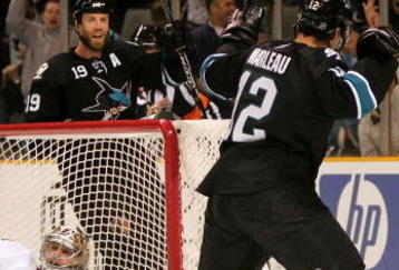 SAN JOSE, CA - DECEMBER 01:  Patrick Marleau #12 and Joe Thornton #19 of the San Jose Sharks celebrate after Marleau scored a goal on goalie Brian Elliott #30 of the Ottawa Senators at HP Pavilion on December 1, 2009 in San Jose, California.  (Photo by Ezra Shaw/Getty Images)