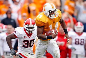 KNOXVILLE, TN - OCTOBER 10: Eric Berry #14 of the Tennessee Volunteers runs with the ball after intercepting a pass during the SEC game against the Georgia Bulldogs at Neyland Stadium on October 10, 2009 in Knoxville, Tennessee. (Photo by Andy Lyons/Getty Images)