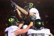 TUCSON, AZ - NOVEMBER 21: Wide receiver Jeff Maehl #23 of the Oregon Ducks celebrates with teammates after scoring a second quarter touchdown against the Arizona Wildcats during the college football game at Arizona Stadium on November 21, 2009 in Tucson, Arizona. The Ducks defeated the Wildcats 44-41 in second overtime. (Photo by Christian Petersen/Getty Images)