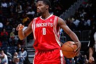 ATLANTA - NOVEMBER 20:  Aaron Brooks #0 of the Houston Rockets against the Atlanta Hawks at Philips Arena on November 20, 2009 in Atlanta, Georgia.  NOTE TO USER: User expressly acknowledges and agrees that, by downloading and/or using this Photograph, User is consenting to the terms and conditions of the Getty Images License Agreement.  (Photo by Kevin C. Cox/Getty Images)