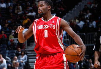 ATLANTA - NOVEMBER 20:  Aaron Brooks #0 of the Houston Rockets against the Atlanta Hawks at Philips Arena on November 20, 2009 in Atlanta, Georgia.  NOTE TO USER: User expressly acknowledges and agrees that, by downloading and/or using this Photograph, User is consenting to the terms and conditions of the Getty Images License Agreement.  (Photo by Kevin C. Cox/Getty Images)