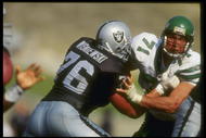 10 Oct 1993:  Defensive lineman Bill Pickel of the New York Jets (right) and Los Angeles Raiders offensive lineman Steve Wisniewski tangle up during a game at the Coliseum in Los Angeles, California.  The Raiders won the game, 24-20. Mandatory Credit: Mik