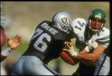 10 Oct 1993:  Defensive lineman Bill Pickel of the New York Jets (right) and Los Angeles Raiders offensive lineman Steve Wisniewski tangle up during a game at the Coliseum in Los Angeles, California.  The Raiders won the game, 24-20. Mandatory Credit: Mik
