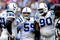 HOUSTON - NOVEMBER 29: Defensive tackles Antonio Johnson #99 and Daniel Muir #90 chat with linebacker Ramon Humber #59 of the Indianapolis Colts chat during a time out against the Houston Texans at Reliant Stadium on November 29, 2009 in Houston, Texas.  (Photo by Bob Levey/Getty Images)