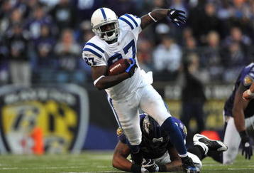 BALTIMORE - NOVEMBER 22:  Reggie Wayne #87 of the Indianapolis Colts runs the ball against the Baltimore Ravens at M&T Bank Stadium on November 22, 2009 in Baltimore, Maryland. The Colts defeated the Ravens 17-15. (Photo by Larry French/Getty Images)