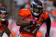DENVER - OCTOBER 04:  Running back Knowshon Moreno #27 of the Denver Broncos rushes against the Dallas Cowboys during NFL action at Invesco Field at Mile High on October 4, 2009 in Denver, Colorado. The Broncos defeated the Cowboys 17-10.  (Photo by Doug Pensinger/Getty Images)