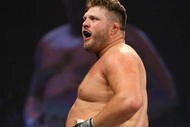 UNCASVILLE, CT - MAY 16: Roy Nelson (White Trunks) of the Lions Den celebrates after beating Brad Imes MilesTech Fighting System during their bout presented by the International Fighting League at the Mohegan Sun Arena May 16, 2008 in Uncasville, Connecticut.  (Photo by Al Bello/Getty Images)